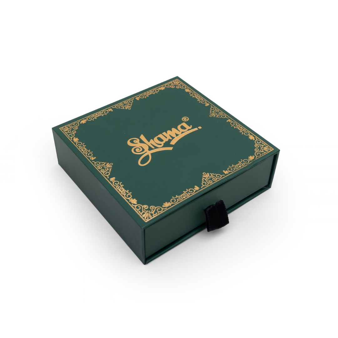 Green box with gold accents and 'Shama' branding on a white background